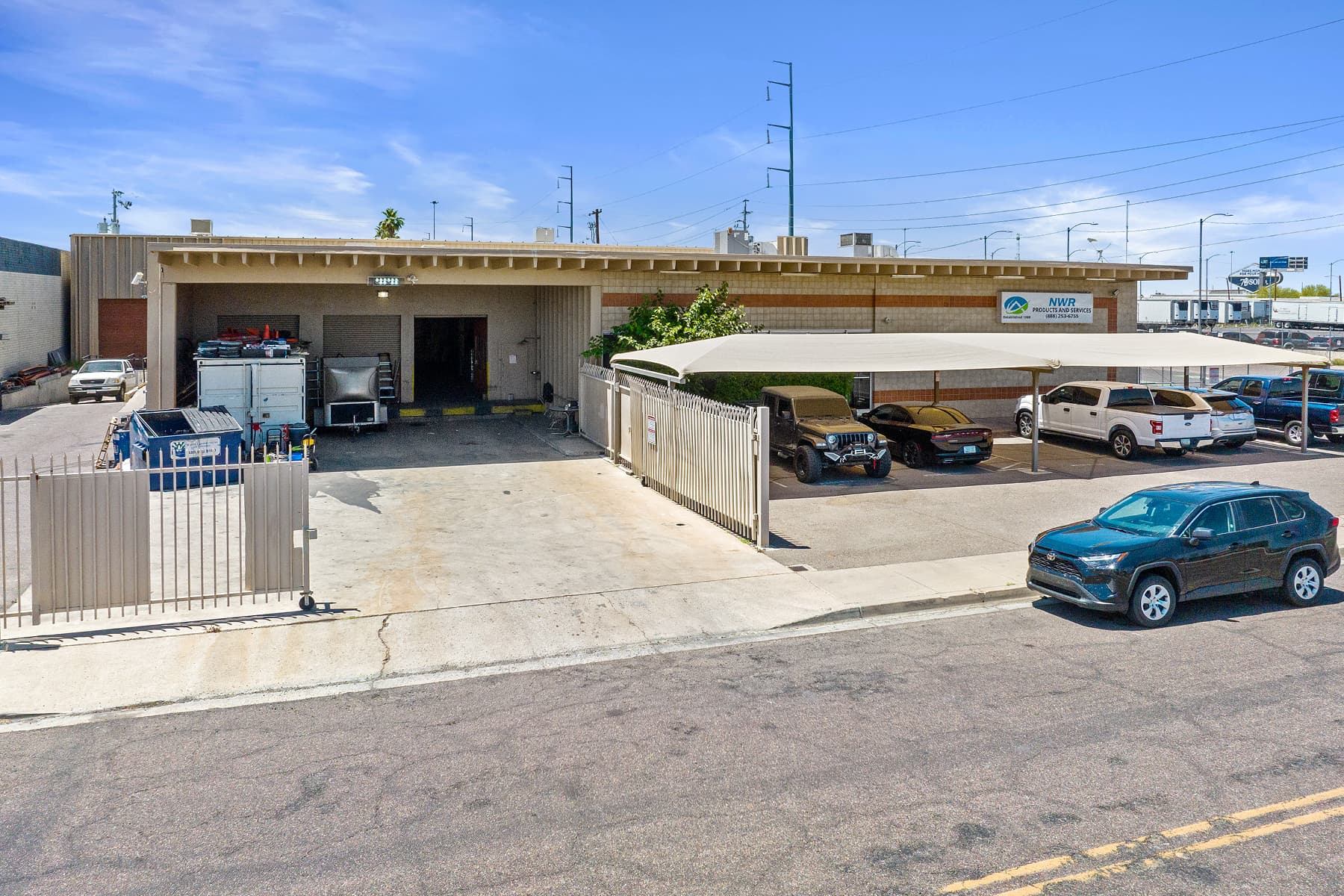 Aerial view of industrial property at 2252 N 23rd Dr in Phoenix, Arizona showing warehouse building, access points, and surrounding site area.