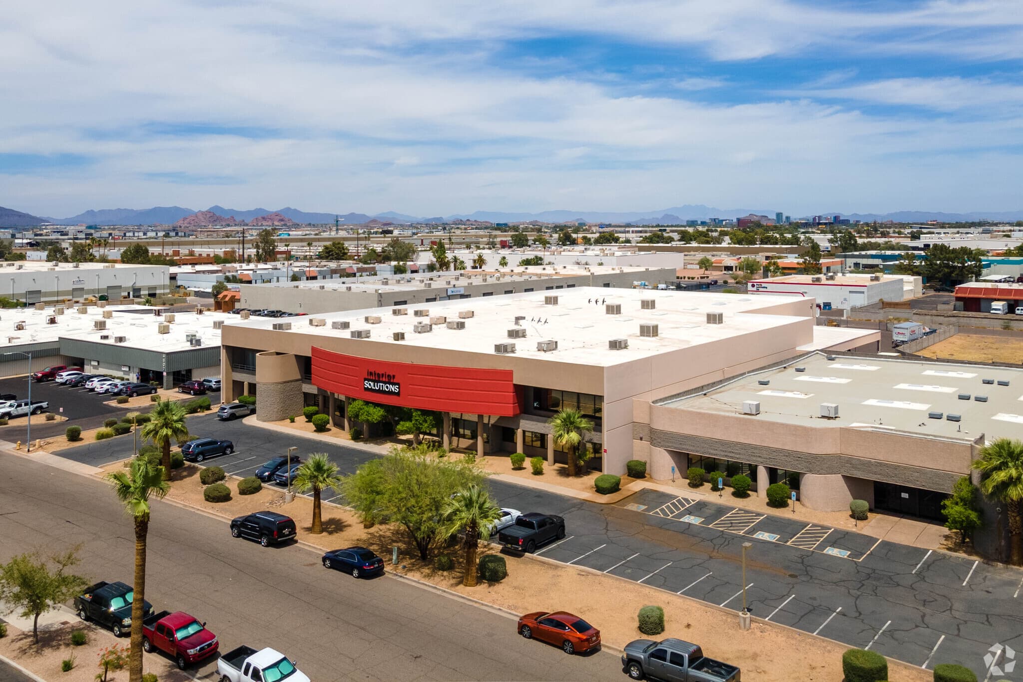 Aerial view of industrial property at 4645 S 35th St in Phoenix, Arizona showing warehouse building, access points, and surrounding site area.