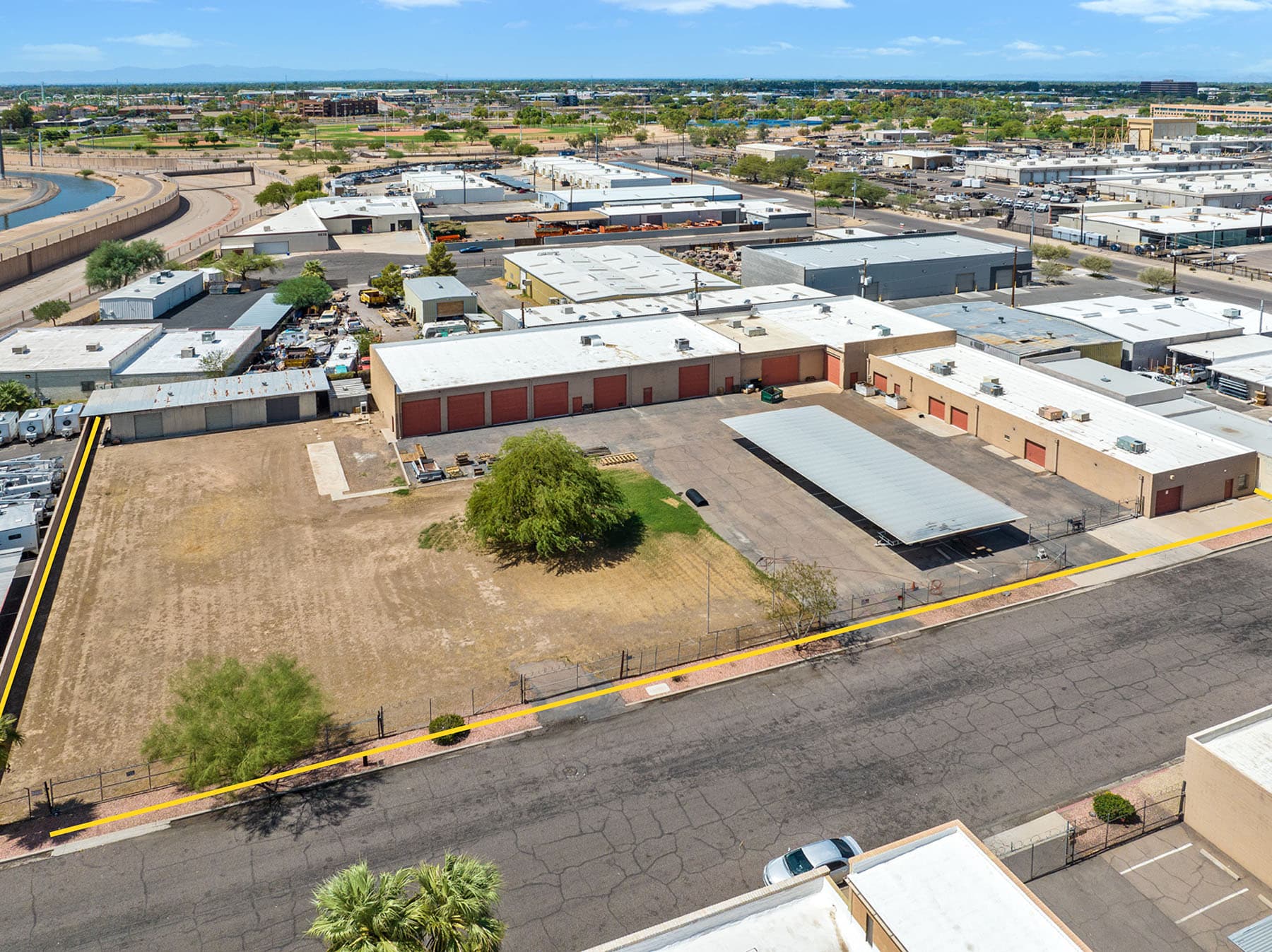 Aerial view of industrial property at 9618-9628 N 21st Dr in Phoenix, Arizona showing warehouse building, access points, and surrounding site area.