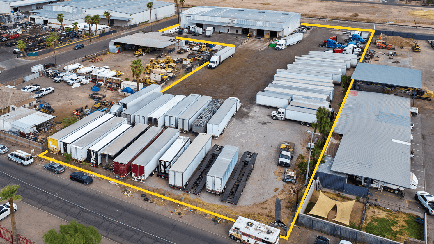 Aerial view of industrial property at 411 S 33rd Ave in Phoenix, Arizona showing warehouse building, access points, and surrounding site area.