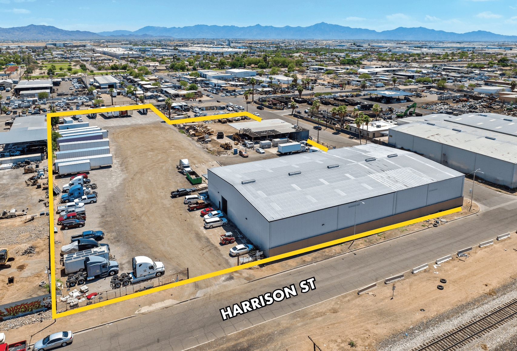 Aerial view of industrial property at 411 S 33rd Avenue in Phoenix, Arizona showing warehouse building, access points, and surrounding site area.