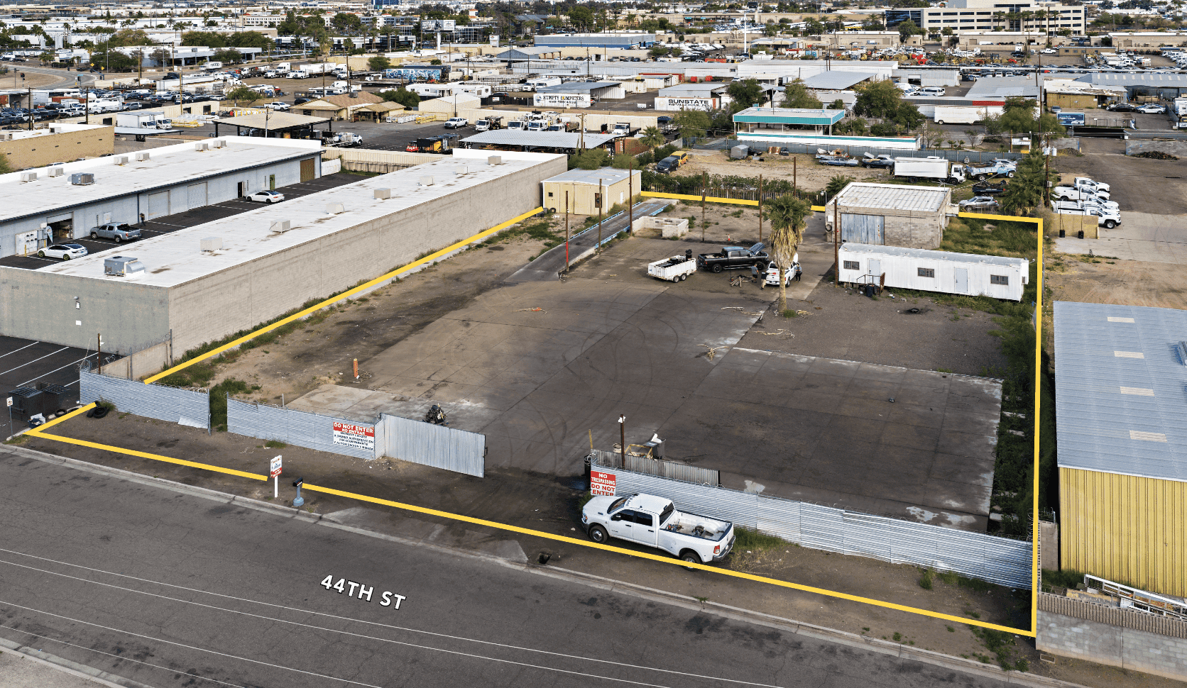 Aerial view of industrial property at 3013 S 44th St in Phoenix, Arizona showing warehouse building, access points, and surrounding site area.