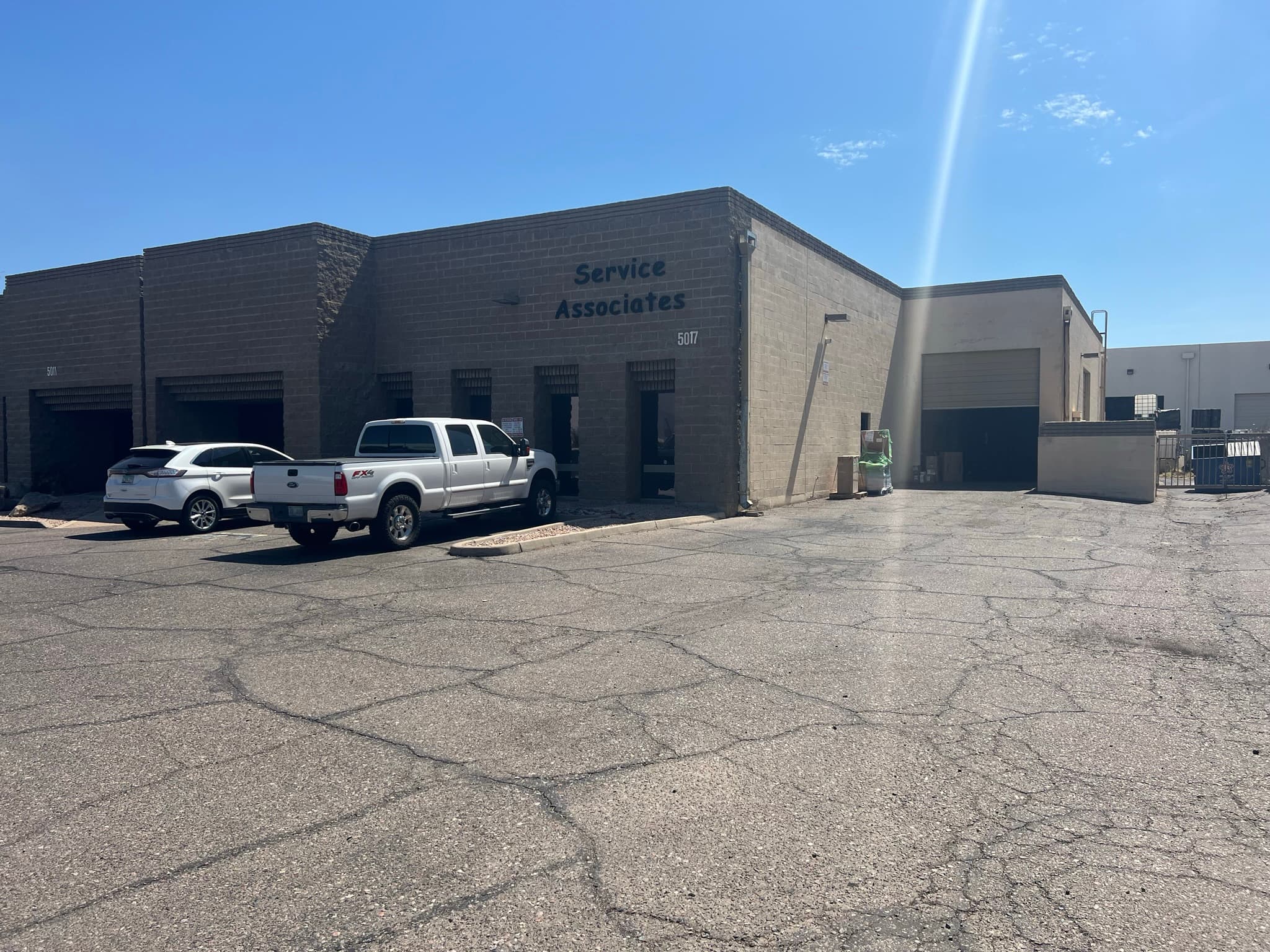 Aerial view of industrial property at 3883 N 36th Ave in Phoenix, Arizona showing warehouse building, access points, and surrounding site area.