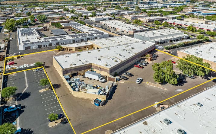 Aerial view of industrial property at 3951 E Palm Ln in Mesa, Arizona showing warehouse building, access points, and surrounding site area.