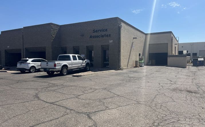 Aerial view of industrial property at 5225 S 39th St in Phoenix, Arizona showing warehouse building, access points, and surrounding site area.