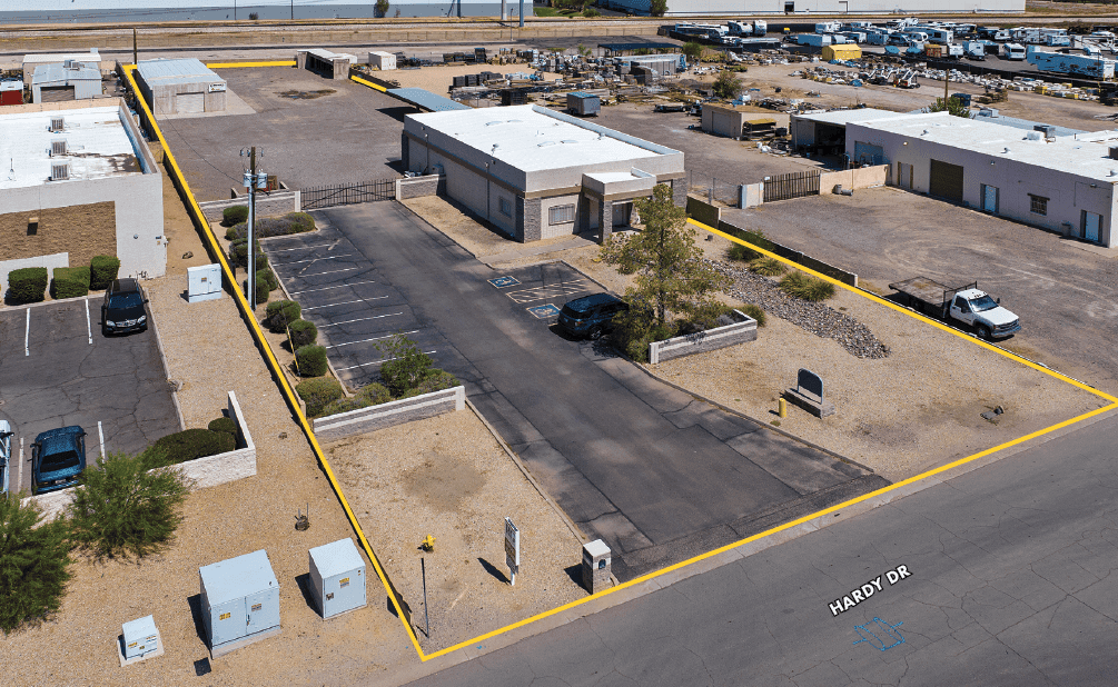 Aerial view of industrial property at 9111 S Hardy Drive in Tempe, Arizona showing warehouse building, access points, and surrounding site area.