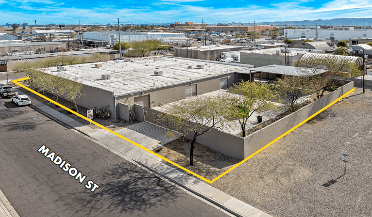 Aerial view of industrial property at 212 S 18th St in Phoenix, Arizona showing warehouse building, access points, and surrounding site area.