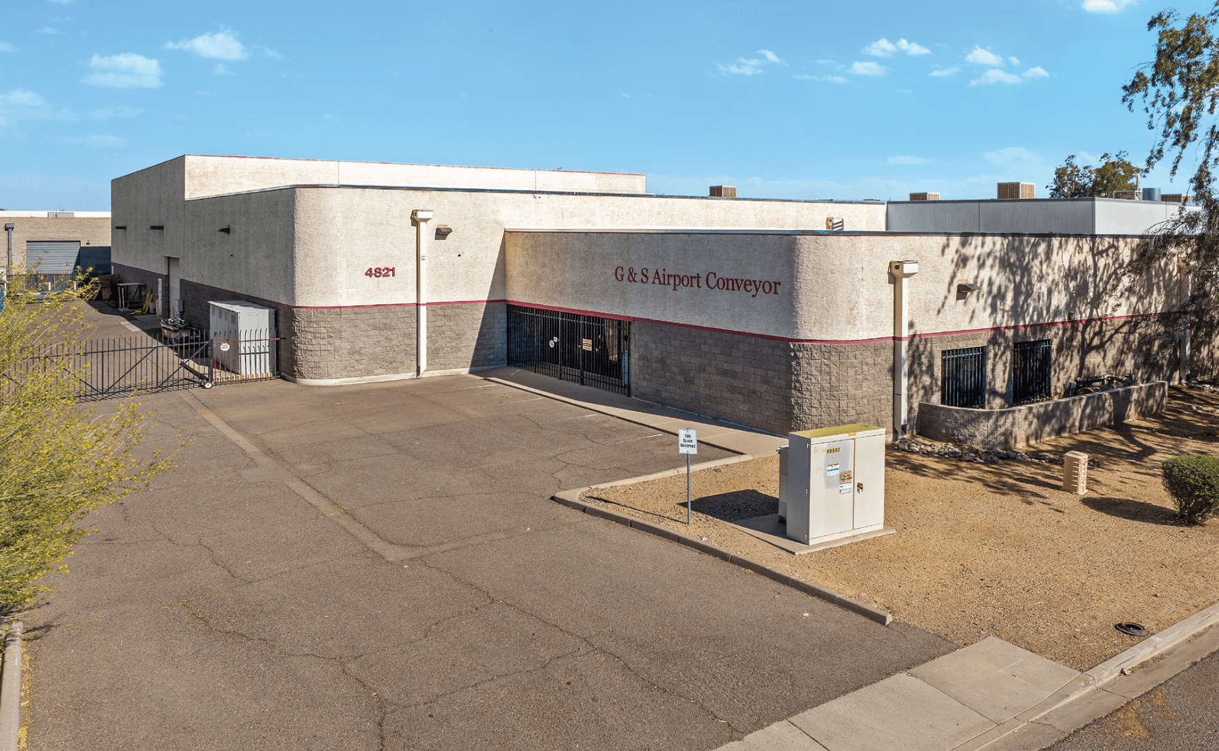 Aerial view of industrial property at 4821 S 33rd St in Phoenix, Arizona showing warehouse building, access points, and surrounding site area.