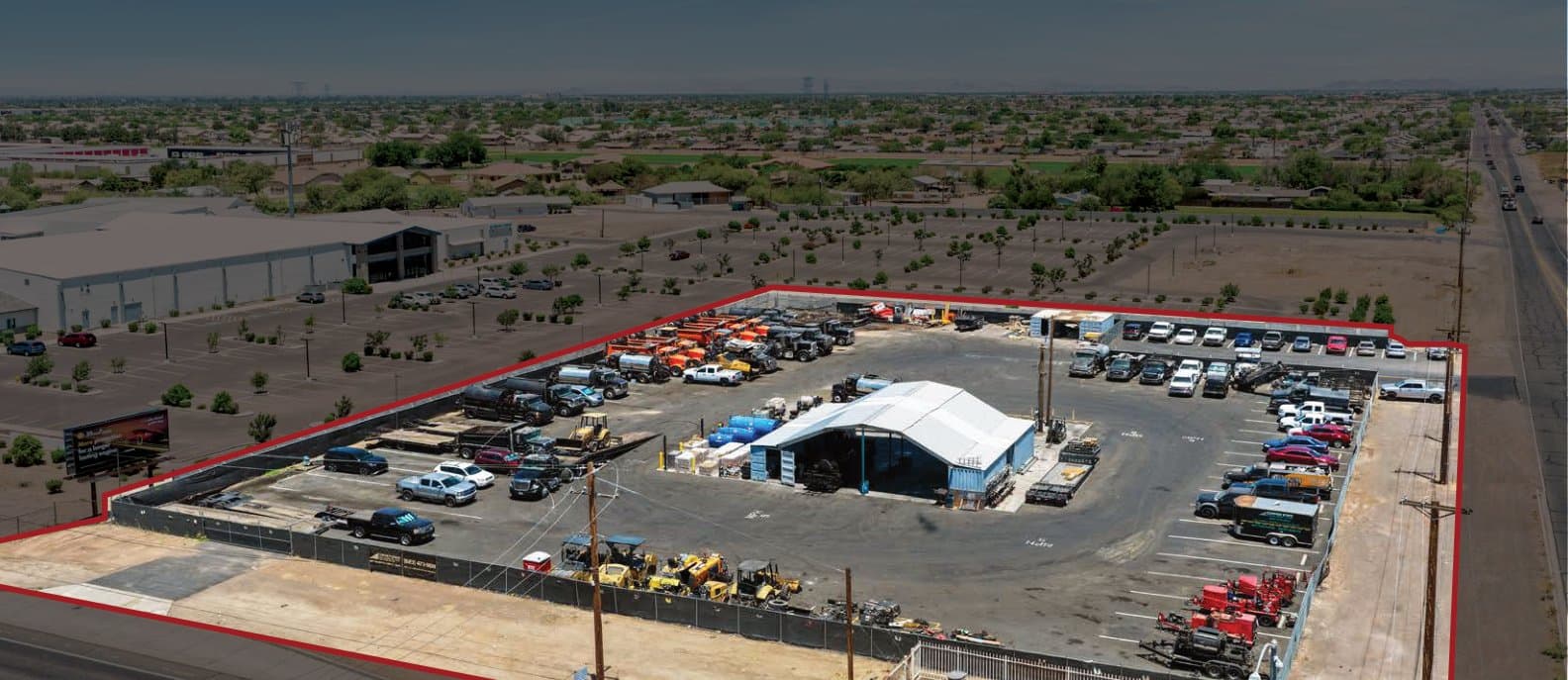 Aerial view of industrial property at 8002 N 83rd Ave in Peoria, Arizona showing warehouse building, access points, and surrounding site area.