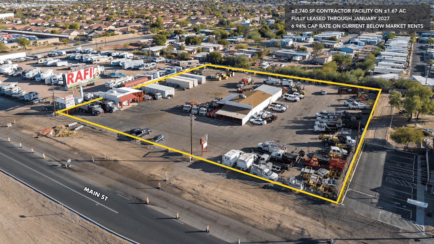 Aerial view of industrial property at 10317 E Apache Trl in Apache Junction, Arizona showing warehouse building, access points, and surrounding site area.