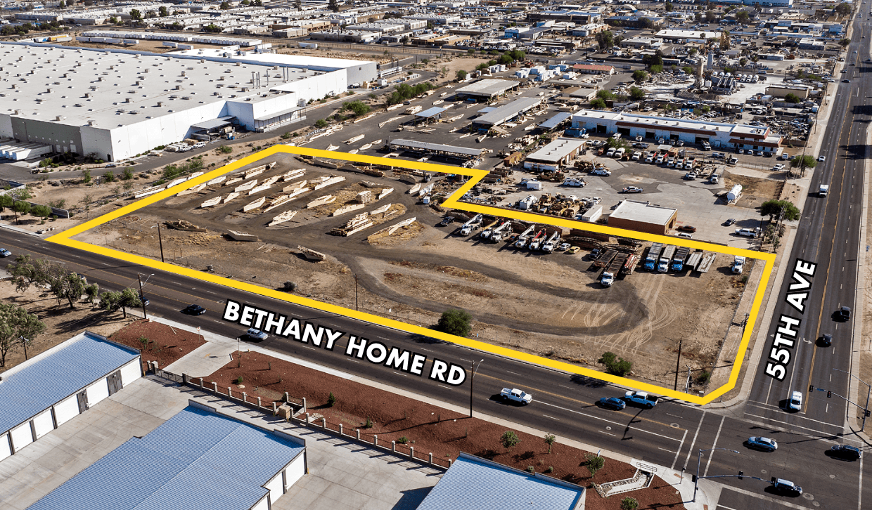 Aerial view of industrial property at SEC of 55th Ave & W Bethany Home in Glendale, Arizona showing warehouse building, access points, and surrounding site area.