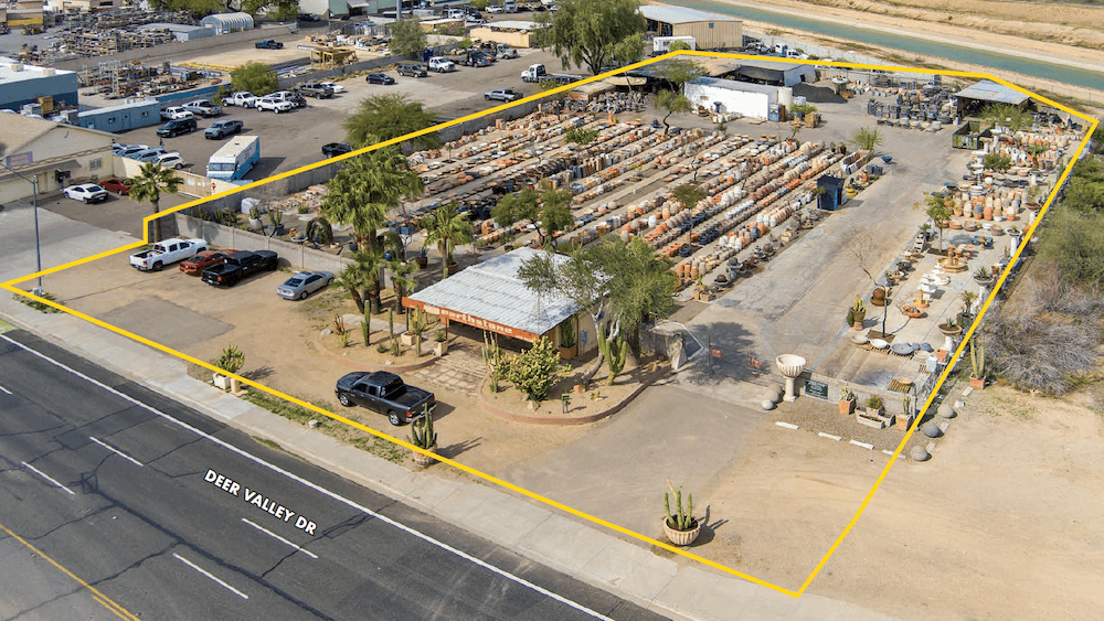 Aerial view of industrial property at 1974 E Deer Valley Rd in Phoenix, Arizona showing warehouse improvements, yard area, truck access, and outdoor storage space.