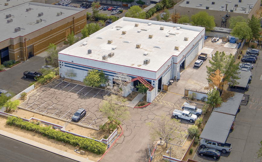 Aerial view of industrial property at 2031 W Lone Cactus Dr in Phoenix, Arizona showing warehouse building, access points, and surrounding site area.