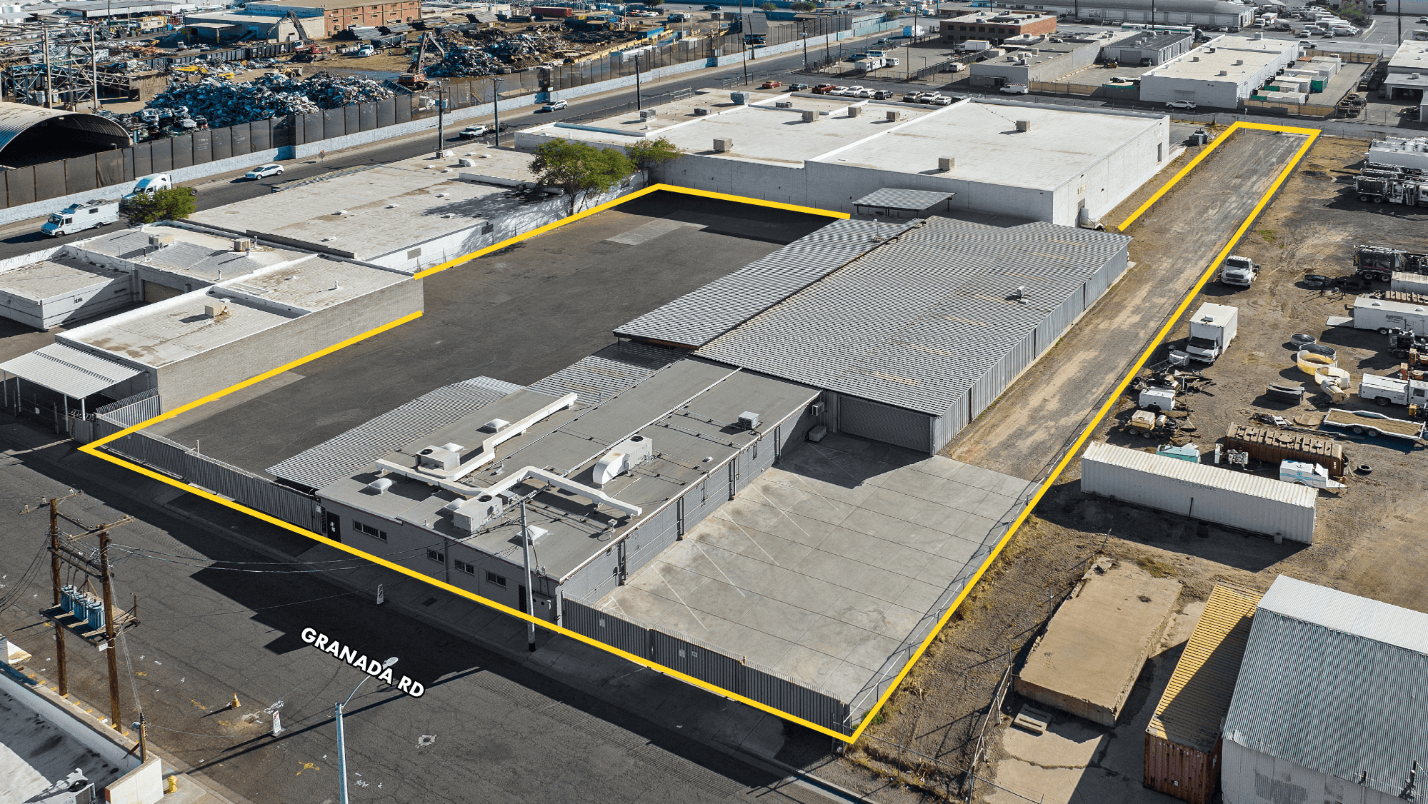 Aerial view of industrial property at 2221 W Granada Rd in Phoenix, Arizona showing warehouse building, access points, and surrounding site area.