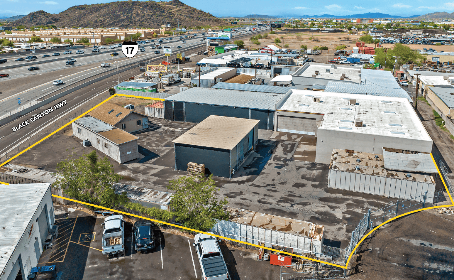 Aerial view of industrial property at 22001 N Black Canyon Hwy in Phoenix, Arizona showing warehouse building, access points, and surrounding site area.