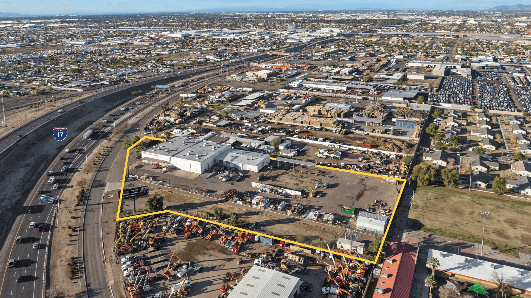 Aerial view of industrial property at 1825 S Black Canyon Hwy in Phoenix, Arizona showing warehouse building, access points, and surrounding site area.