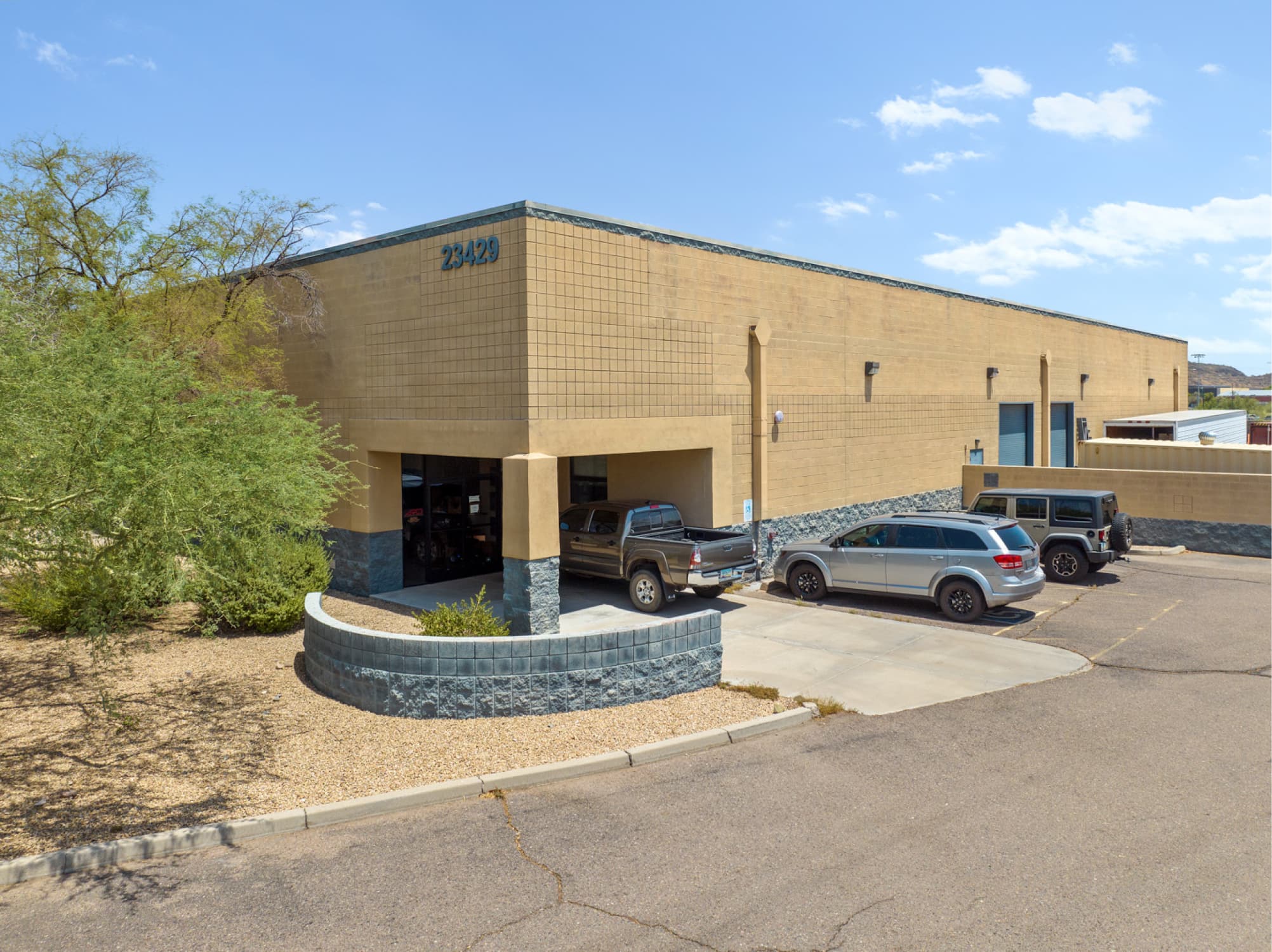 Aerial view of industrial property at 23429 N 35th Dr in Glendale, Arizona showing warehouse building, access points, and surrounding site area.