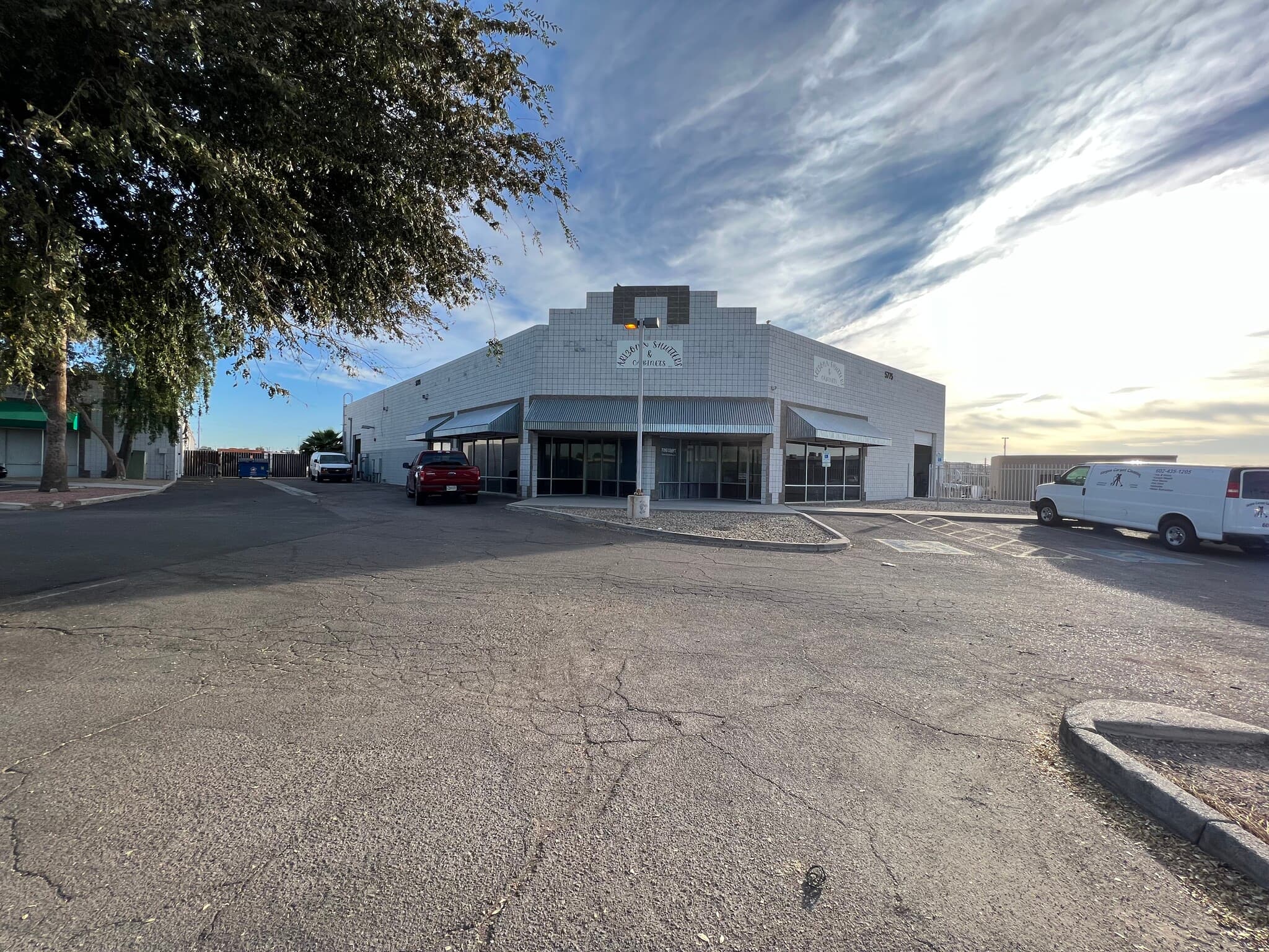 Aerial view of industrial property at 5775 N 51st Ave in Glendale, Arizona showing warehouse building, access points, and surrounding site area.