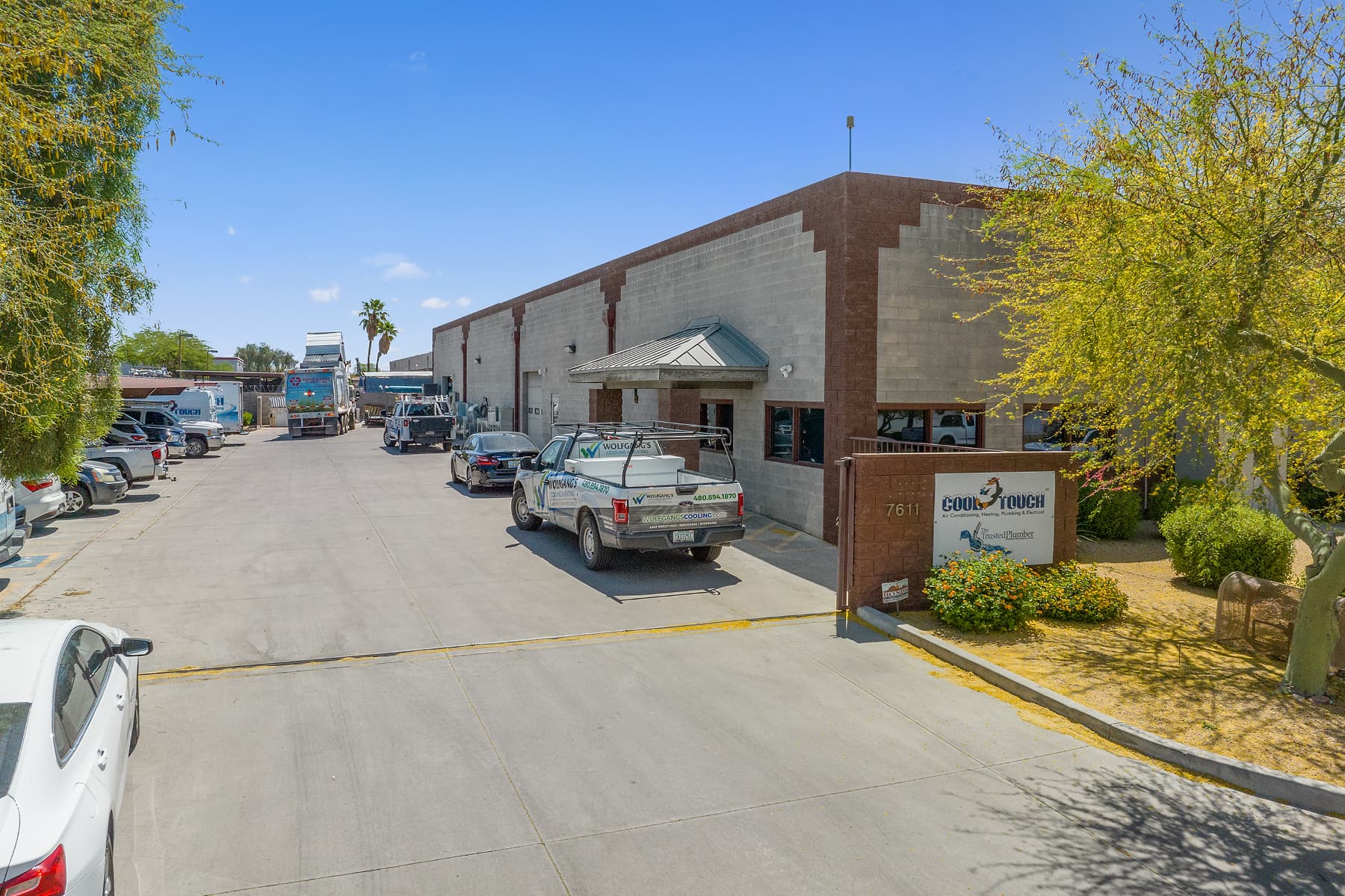 Aerial view of industrial property at 7611 N 74th Ave in Glendale, Arizona showing warehouse building, access points, and surrounding site area.
