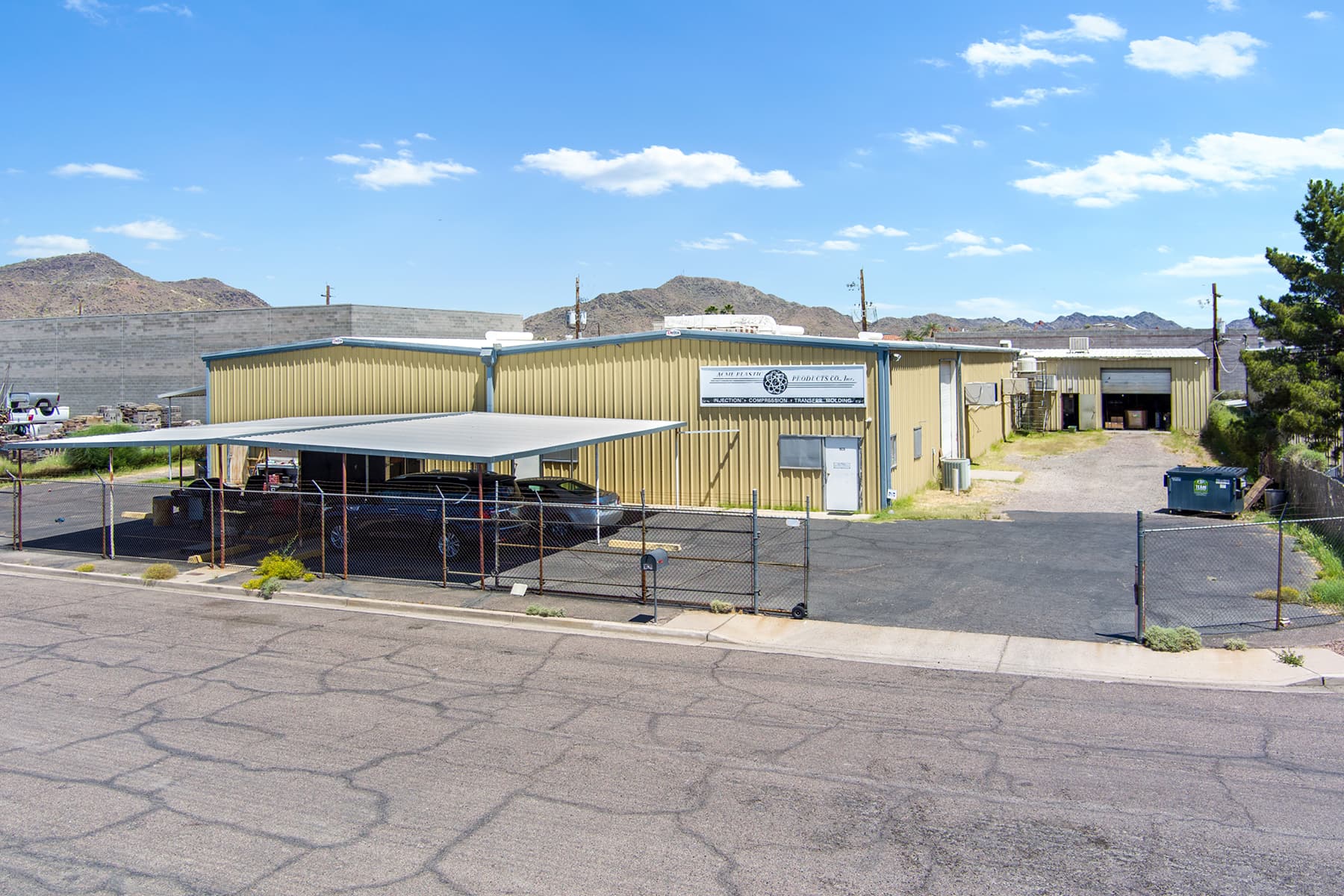 Aerial view of industrial property at 9629-9631 N 22nd Ave in Phoenix, Arizona showing warehouse building, access points, and surrounding site area.